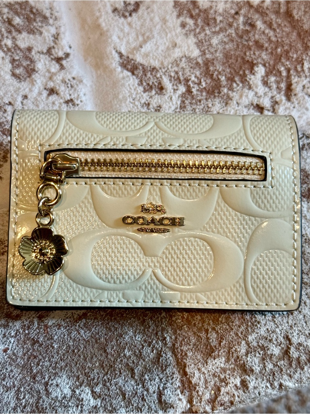 COACH Signature Embossed Mini Wallet with Floral Charm